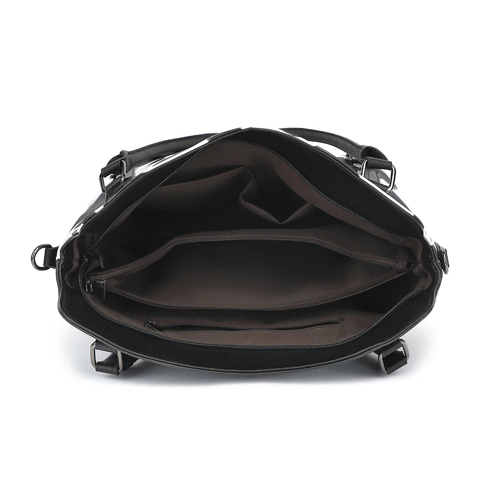 A black women's classic cow print PU leather tote bag shown open.