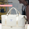 A cream-colored travel fitness bag with a separate shoe compartment is shown next to a woman.