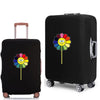 A black rolling suitcase with a colorful daisy graphic printed on the side.