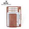 A brown leather wallet with multiple slots for credit cards and cash, designed to block RFID signals.