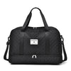 Black Zuomnni durable nylon travel duffle bag with padded handles
