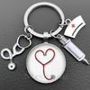 Silver keychain featuring a heart stethoscope charm and a medical syringe.