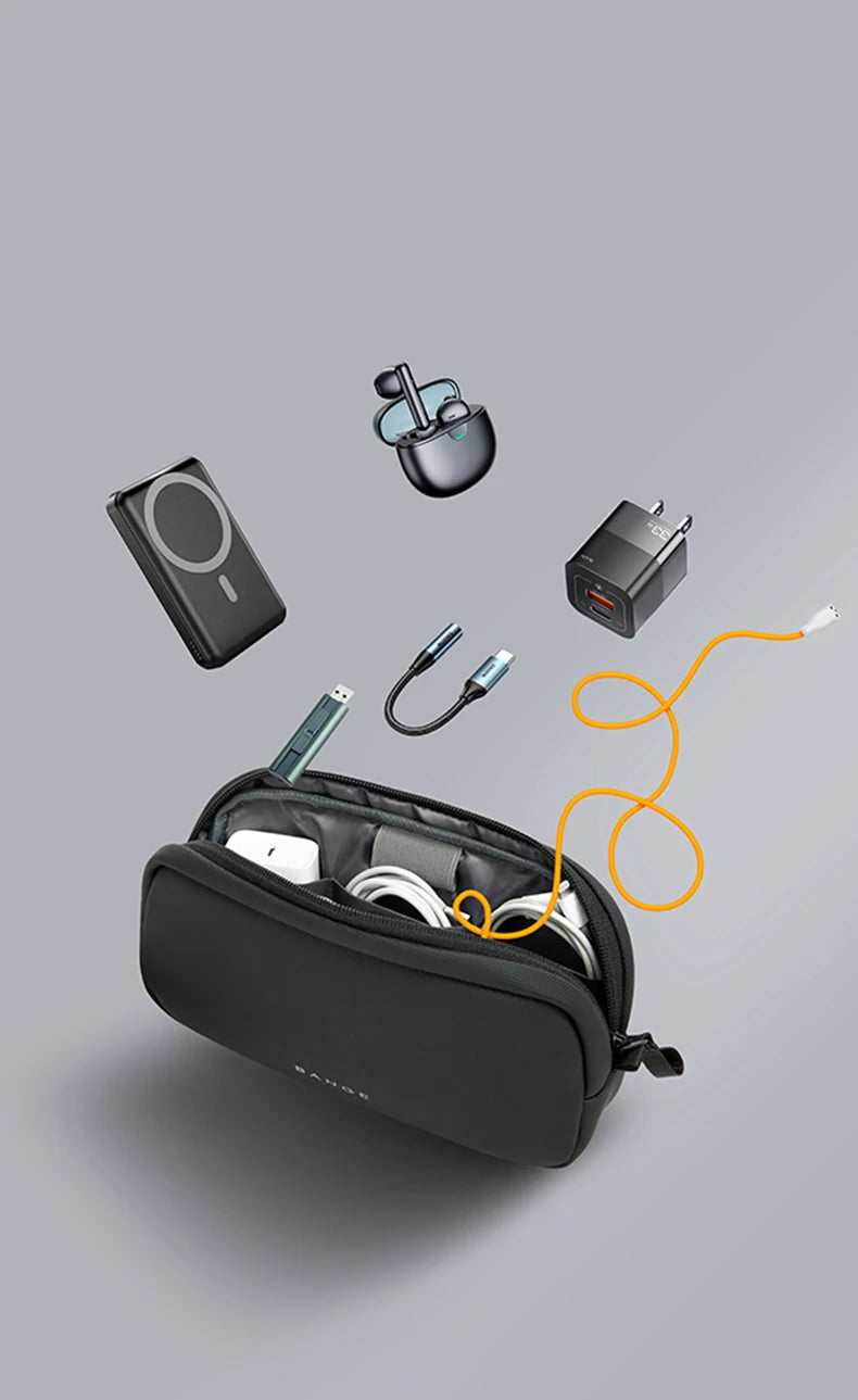 A black travel electronics organizer pouch containing various gadgets like headphones and cables.