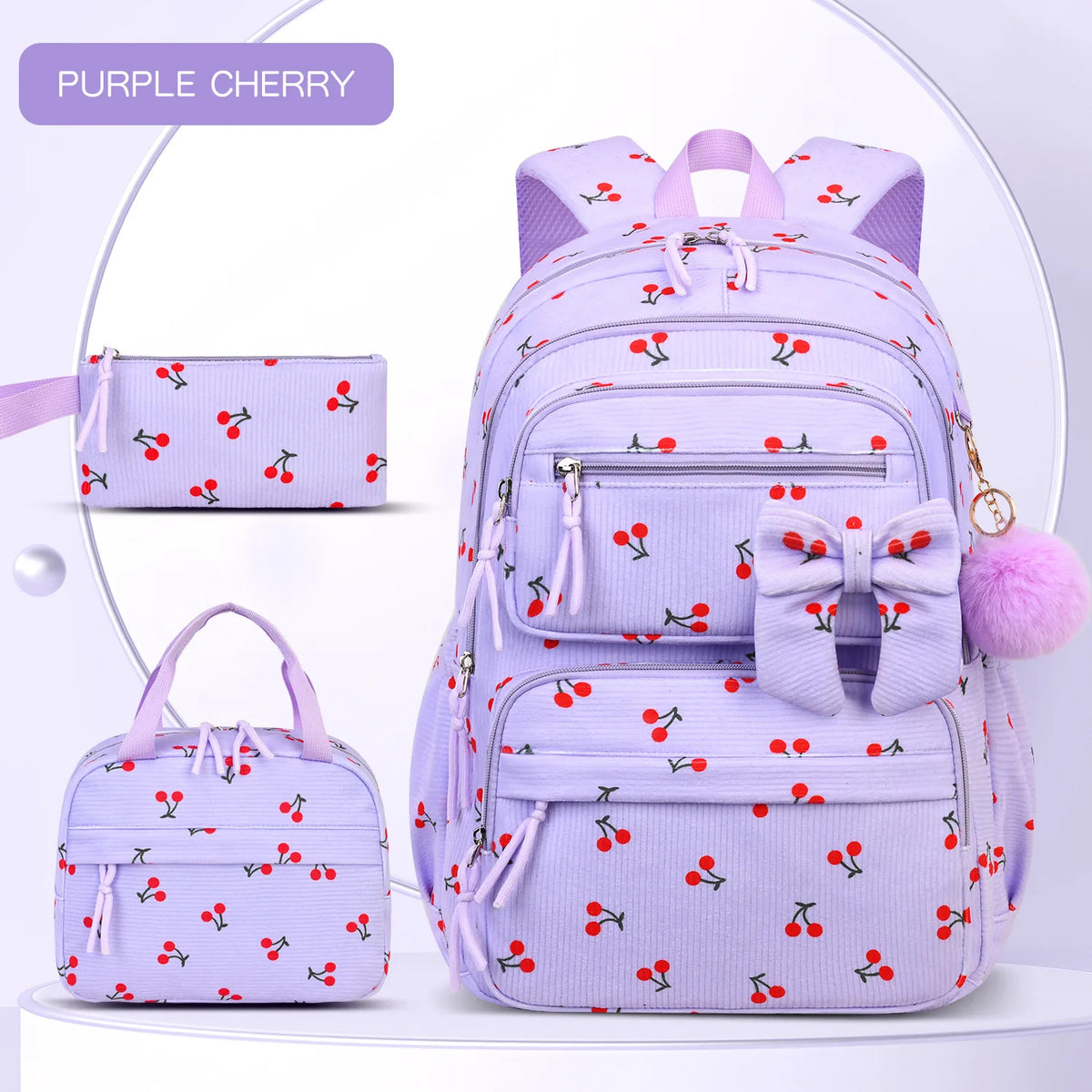 Lila Kirschmuster-Rucksack-Set mit Hauptrucksack und separatem Beutel.