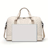 A beige durable nylon travel duffle bag with light tan straps and a blank white laptop sleeve.