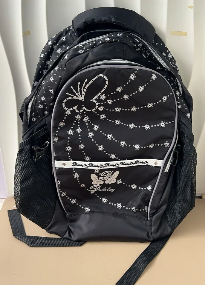 A black backpack featuring a butterfly print design with silver detailing.