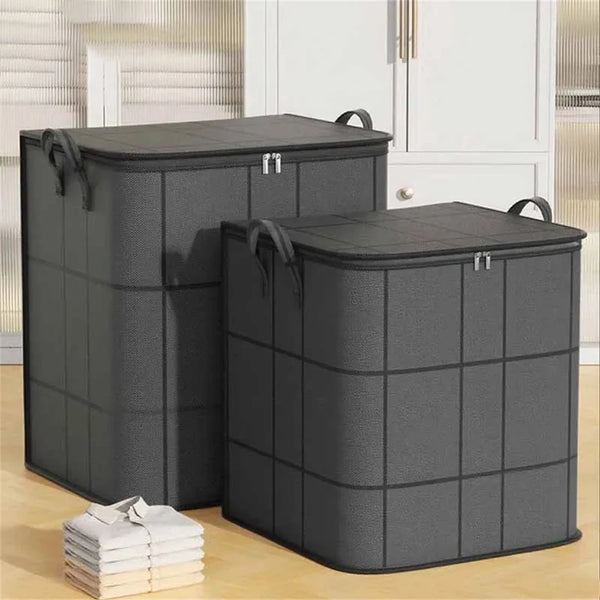 Two large gray foldable non-woven storage bags standing next to a white cabinet.