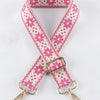 Pink and white patterned replacement bag strap with gold-toned adjustable buckles