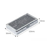 A silver metal cigarette case holder with intricate engraving, shown from above.
