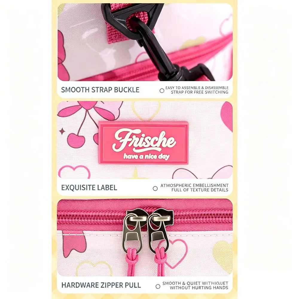 Pink insulated double-layer lunch bag for kids with cartoon prints featuring a smooth strap buckle and hardware zipper pull