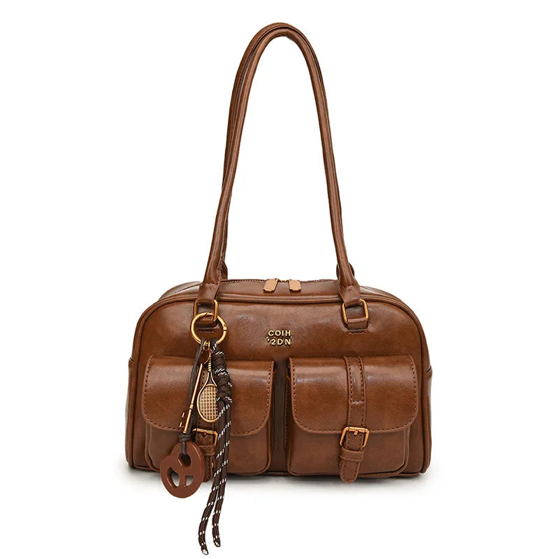 A brown vintage letter print crossbody bag with a leather strap and gold hardware.