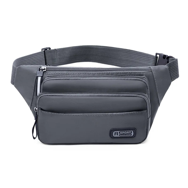 Petit sac banane imperméable gris foncé avec sangle et compartiments zippés.