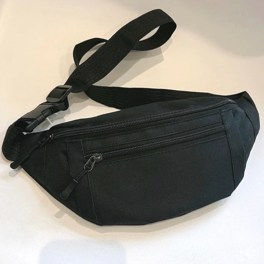 A black nylon waist bag with a zippered compartment and adjustable strap is shown against a white background.