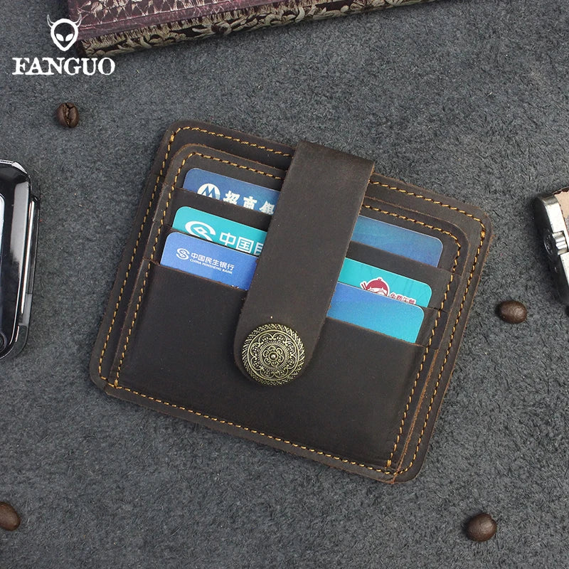 A brown genuine leather card wallet with a magnetic closure holding several credit cards and an ID.