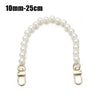 A strand of white pearls used as a strap for a handbag or purse.
