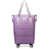 Pochette de voyage violette extensible multi-usage avec poignées et roues.