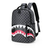 A black and gray checkered backpack featuring a white tooth design on the front.