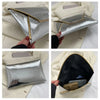 Silver crocodile pattern coin purse clutch shown in various angles against a light background.