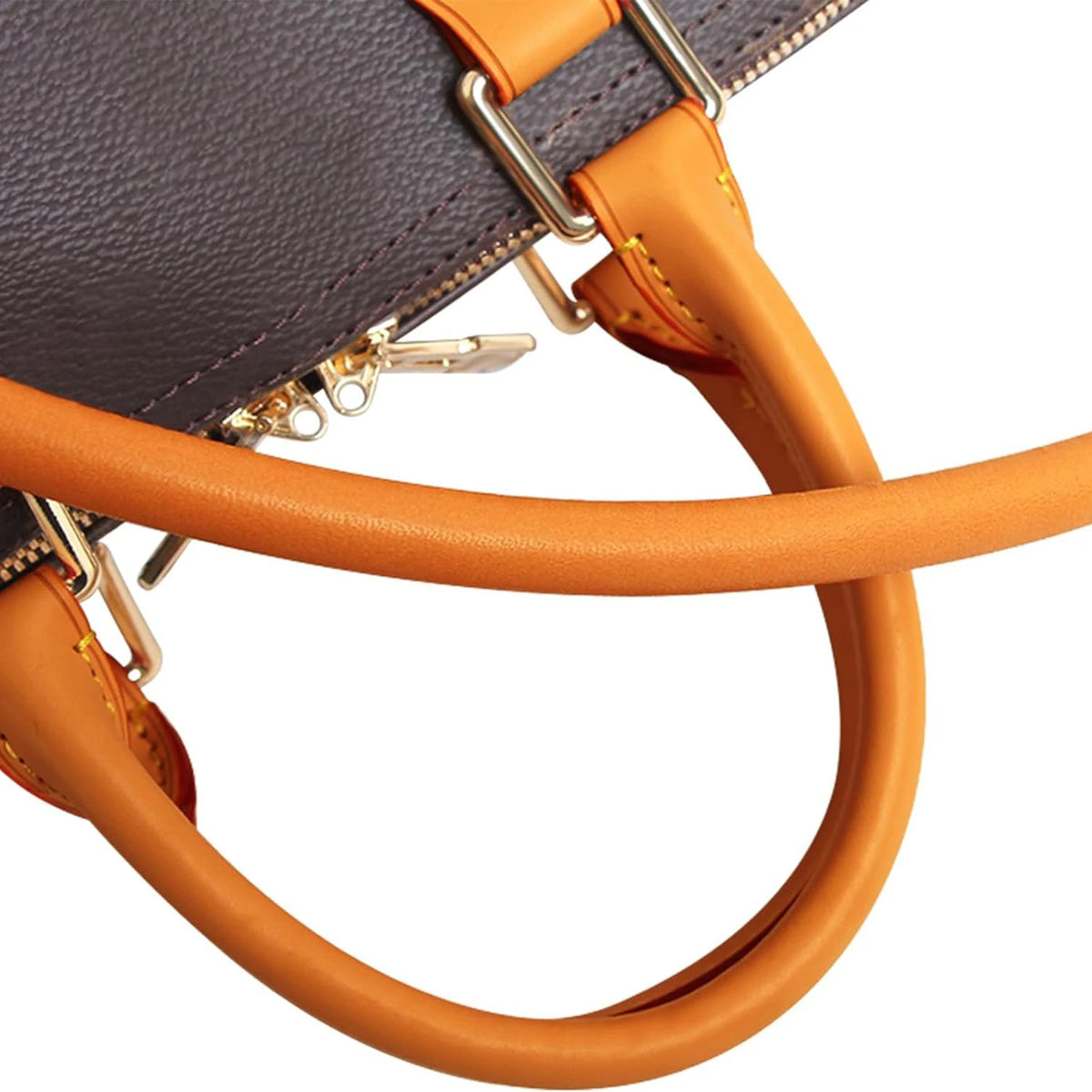 Close-up of an orange leather replacement shoulder strap attached to a dark gray handbag.