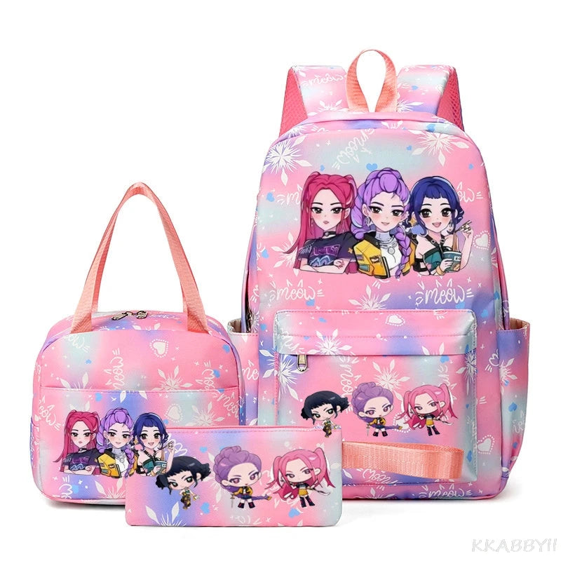 A pink multi-compartment backpack set featuring cute anime-style characters on a floral background.