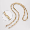 A close-up view of a gold chain strap for handbags and crossbody bags
