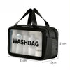 Black plastic washbag with a clear window showing various bottles, measuring 31cm by 21cm.