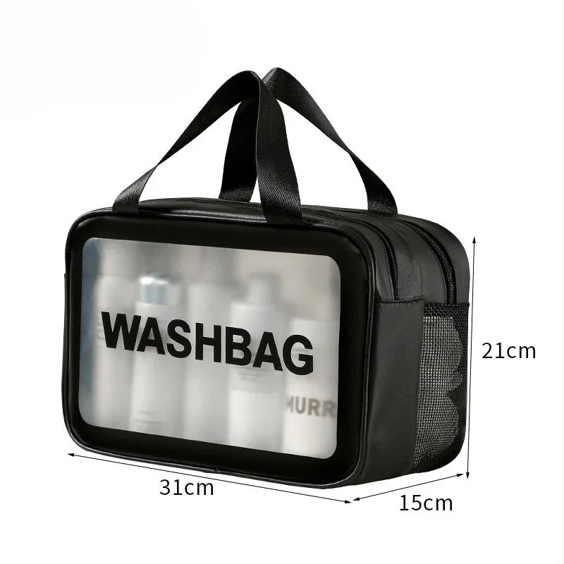 Black plastic washbag with a clear window showing various bottles, measuring 31cm by 21cm.