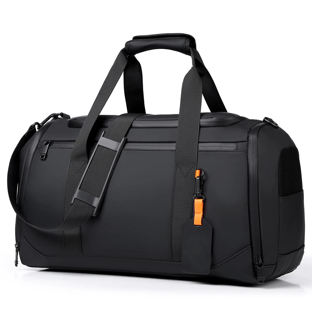 A black large capacity travel duffel bag with padded straps and a zipper pull.