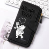 A black zippered pouch featuring a Winnie the Pooh design with a bear and flowers.