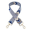 A navy blue and beige patterned nylon strap for bags and luggage