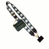 A dark green and white patterned lanyard with a leather wallet and a black tassel.