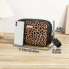 A black leopard print crossbody bag next to a white smartphone, showing its dimensions.