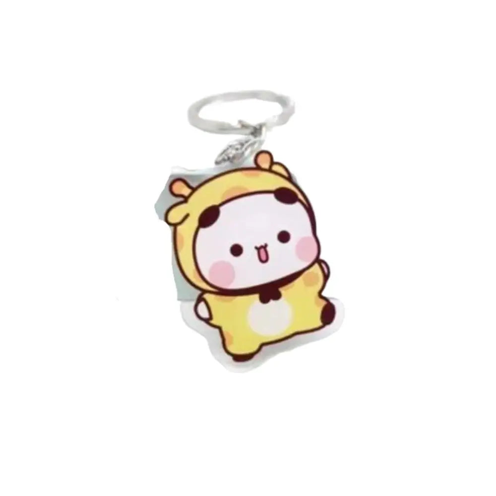 A yellow and black cartoon character charm made of resin attached to a silver keyring.