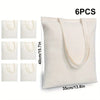 Six paires de sacs en toile de coton beige de différentes tailles et angles.