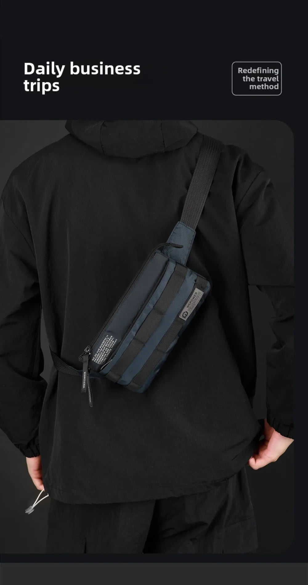 A person wearing a black hoodie holds a dark gray multifunctional chest bag against their torso.