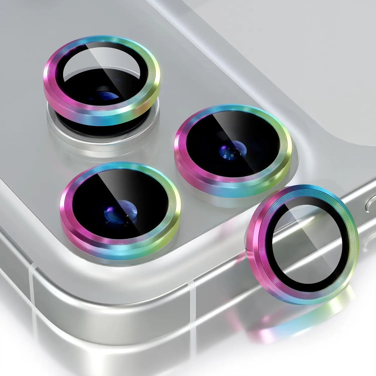 A close-up view of a glitter diamond camera lens protector with a metal frame for an iPhone, showing multiple lenses.