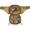 A tan multi-compartment waist pack featuring a holster and various tools for outdoor adventures.