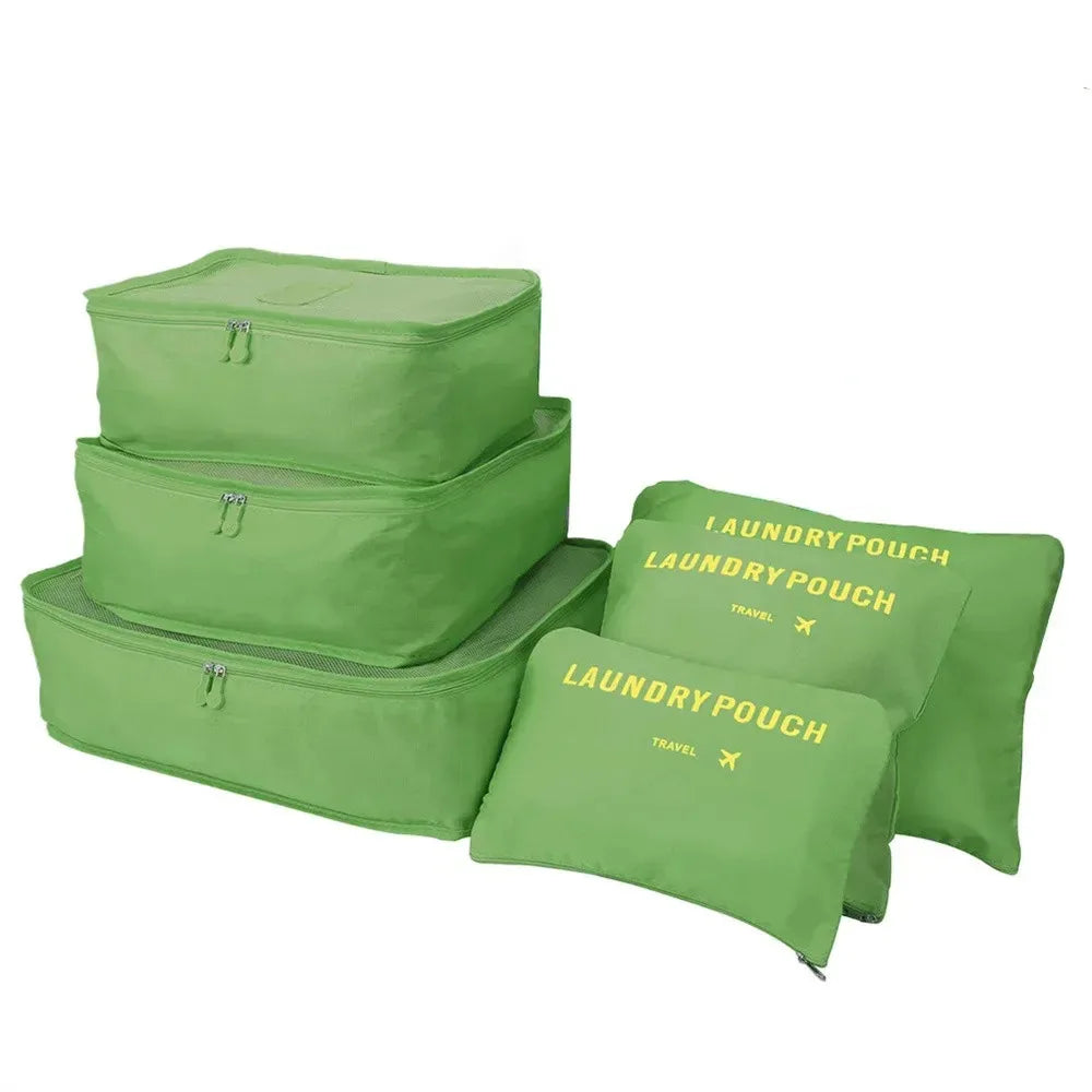 A set of three olive green mesh laundry pouches for travel organization.