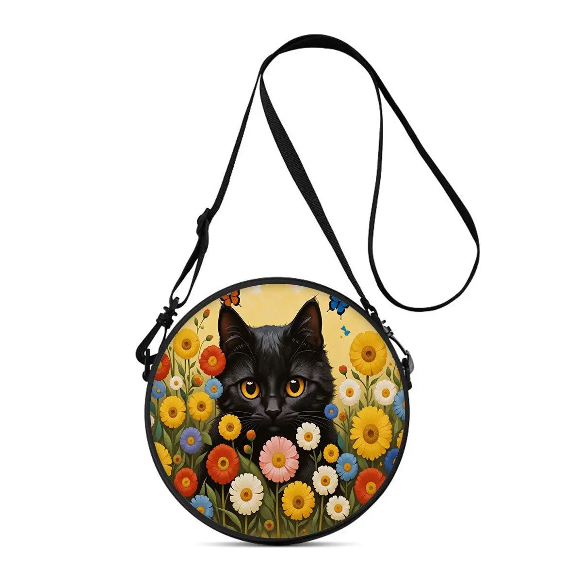A round black cat illustration on a yellow floral background, attached to a black strap.