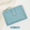 A light blue ultra-thin PU leather card holder wallet with a stitched edge and gold zipper pull.