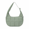 A light sage green quilted nylon shoulder bag with an adjustable strap.