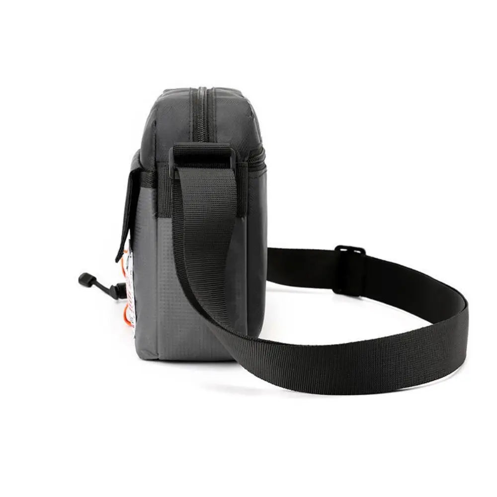 Black waterproof nylon crossbody bag with a strap shown against a white background.