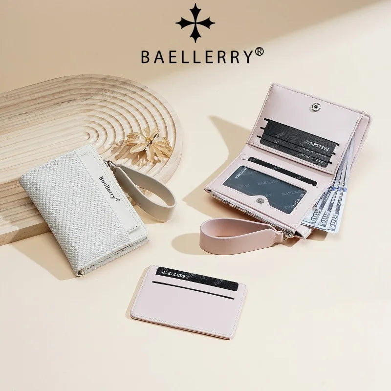 A collection of Baellerry wallets and card holders in pink, white, and beige tones displayed on a light background.