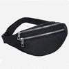 Black adjustable nylon crossbody sling bag with a silver zipper and hardware