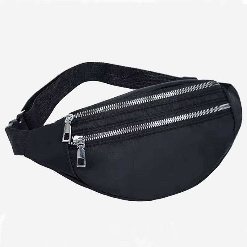 Black adjustable nylon crossbody sling bag with a silver zipper and hardware