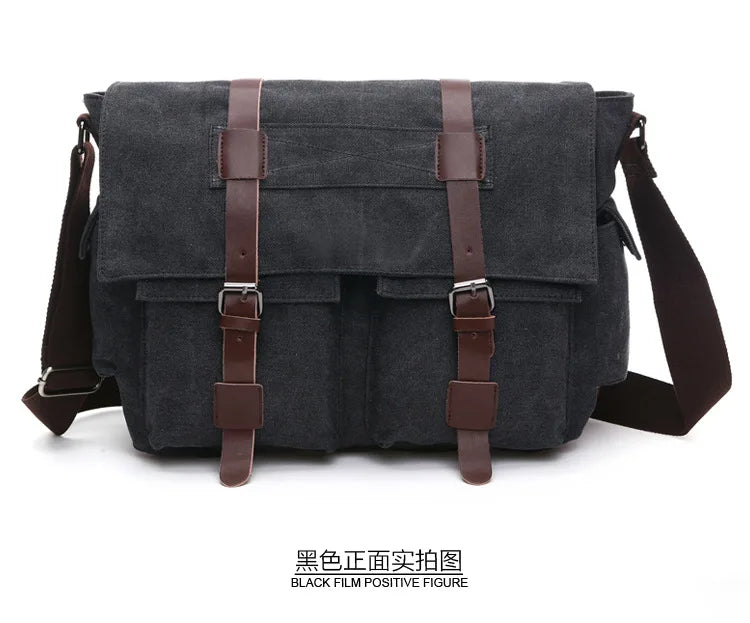 A black canvas messenger bag for men with brown leather straps and buckles.