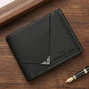 A black slim men's leather RFID blocking bi-fold wallet resting on a wooden surface next to a pen.