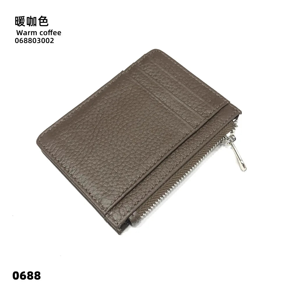 A brown genuine leather zipper card holder and coin purse.
