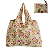 A beige reusable nylon tote bag featuring a colorful pattern of concentric circles in pink, green, and yellow.