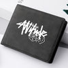 A black PU leather wallet featuring a white cartoon print of the word Attitude and dice.